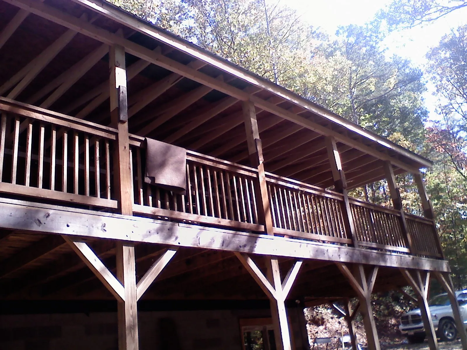 Timber framing under a new elevated porch and deck — Roof Leak Repair in Cedar Park by Roofing Brothers